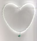 SOLD White &quot;pearl&quot; necklace with green pendant.