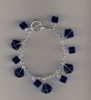 Blue glass charm style bracelet.