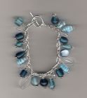 Blue glass charm style bracelet.