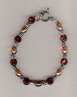 Brown and irridescent bracelet.