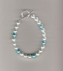 White and turquoise pearlised bracelet.
