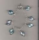Blue and turquoise twist  charm style bracelet.