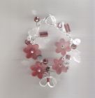 SOLD Red lucite flower charm style bracelet.